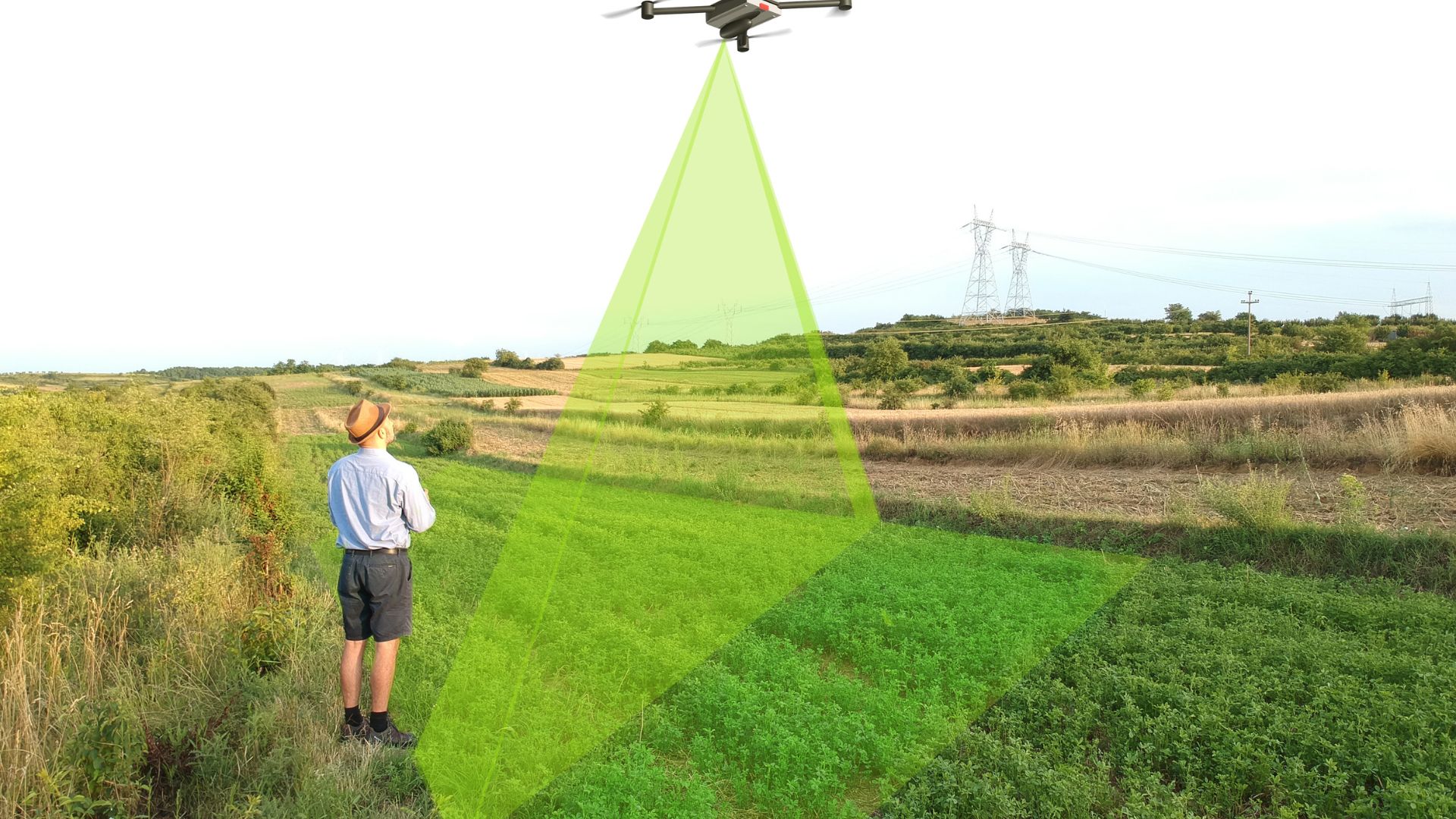 Drone scanning agricultural field with green laser, farmer observing